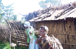 Women carrying firewood for cooking their dinner